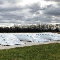 Large white bags for silage storage by HITEC